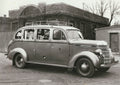 Black-and-white photograph of a vintage Mount Buffalo motor coach from around 1930